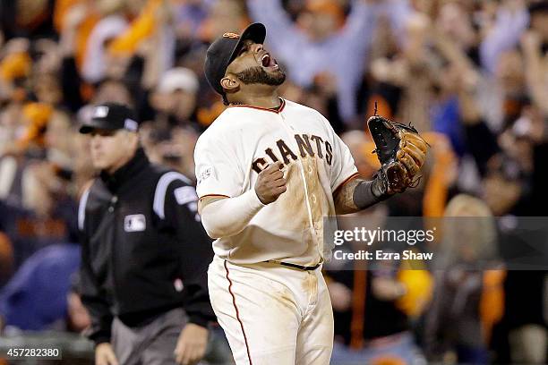 Pablo Sandoval of the San Francisco Giants celebrates after the Giants defeat the St. Louis Cardinals 6-4 in Game Four of the National League...