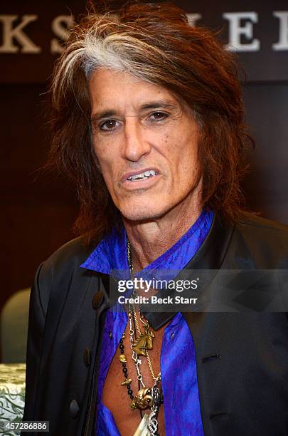 Musician Joe Perry signs copies of his new book "Rocks: My Life In and Out of Aerosmith" at Barnes & Noble bookstore at The Grove on October 15, 2014...