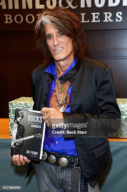 Musician Joe Perry signs copies of his new book "Rocks: My Life In and Out of Aerosmith" at Barnes & Noble bookstore at The Grove on October 15, 2014...