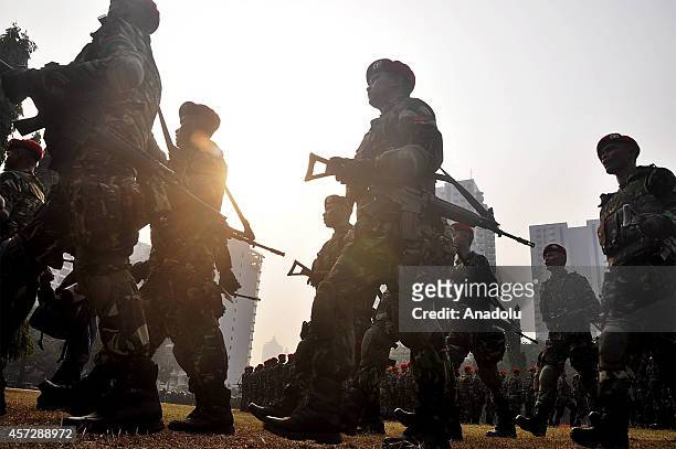 Indonesian soldiers take part in security preparations for the inauguration ceremony of President-elect Joko Widodo and vice president elect Jusuf...