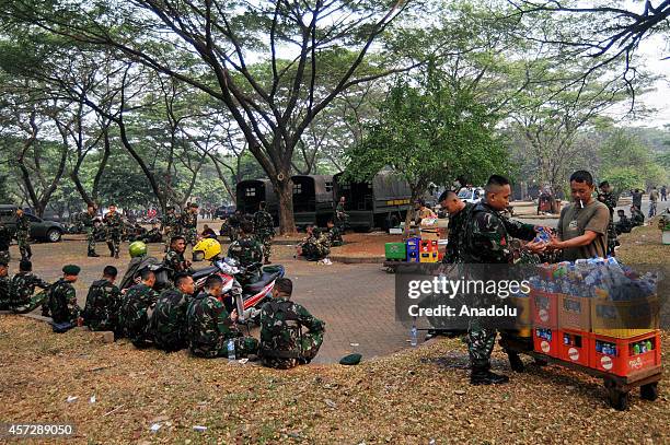 Indonesian soldiers take part in security preparations for the inauguration ceremony of President-elect Joko Widodo and vice president elect Jusuf...