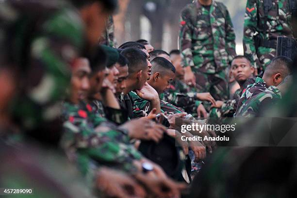 Indonesian soldiers take part in security preparations for the inauguration ceremony of President-elect Joko Widodo and vice president elect Jusuf...