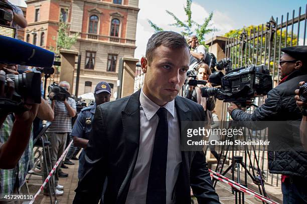 Oscar Pistorius arrives for the fourth day of sentencing at North Gauteng High Court on October 16, 2014 in Pretoria, South Africa. Pistorius will be...