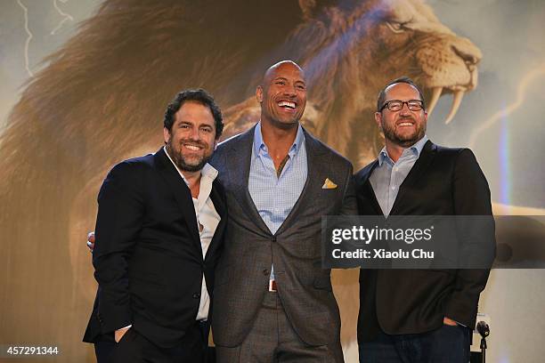 Director Brett Ratner and actor Dwayne Johnson and Producer Beau Flynn attend the Chinese Media Conference of 'Hercules' at the China World Summit...