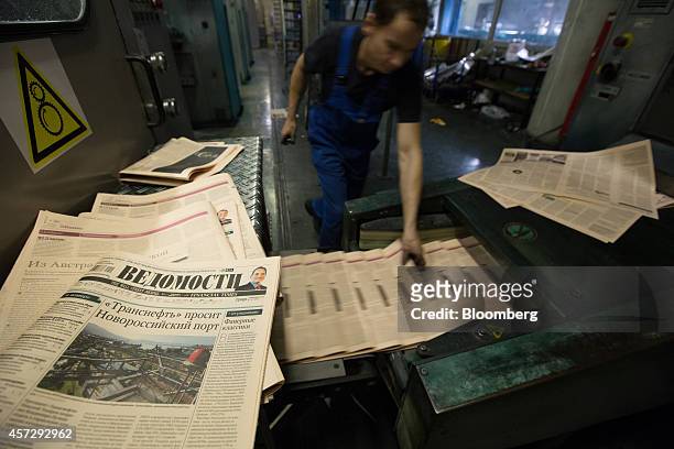 Copies of the Vedomosti daily business newspaper, owned by the Financial Times, the Wall Street Journal and Sanoma Oyj media group, come off the...