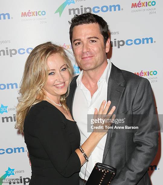 Chantal Craig and Yannick Bisson arrive at the MIPCOM opening Party at Hotel Martinez on October 13, 2014 in Cannes, France.