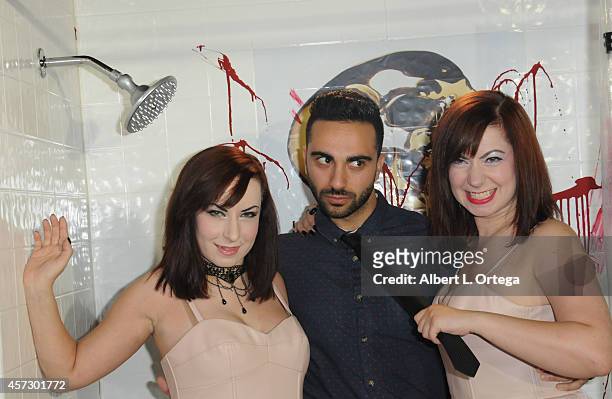 Directors Jen Soska and Sylvia Soska with actor Lee Majdoub arrive for ScreamFest 2014 "See No Evil 2" Screening held at TCL Chinese 6 Theatres on...