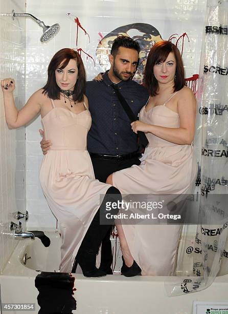 Directors Jen Soska and Sylvia Soska with actor Lee Majdoub arrive for ScreamFest 2014 "See No Evil 2" Screening held at TCL Chinese 6 Theatres on...