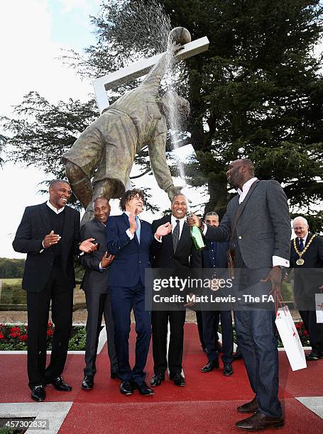 Chris Ramsey, Dave Regis, Shaun Campbell, Les Ferdinand, Chris Hughton and Mo Samba celebrate the unveiling of the Arthur Wharton Statue at St...