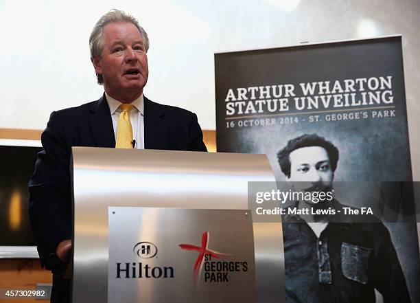 David Sheepshanks, Chairman of St George's Park talks to guests during the unveiling of the Arthur Wharton Statue at St George's Park on October 16,...