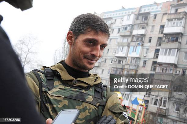 Givi, commander of the pro-Russian separatist Somali battalion, speaks to reporters from their lookout centre near Donetsk's Sergey Prokofiev...