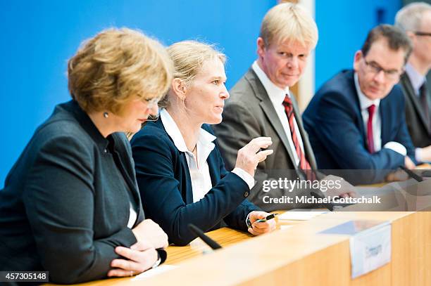 Christiane Schnura, head of Clean Clothes Campaign, Antje von Dewitz, CEO of VAUDE Sport, Reiner Hoffmann, chairman of German union Deutscher...