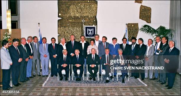 The new Israeli government of Prime minister Yitzhak Shamir poses for the traditional family photo at the president's residence in Jerusalem 20...