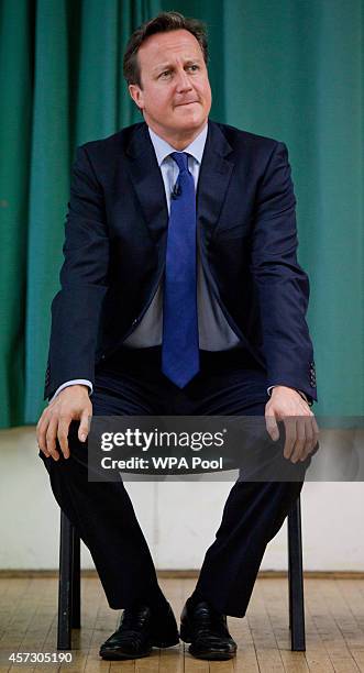 Prime Minister David Cameron takes questions from the audience after introducing the Conservative Party's two applicants councillors Anna Firth and...