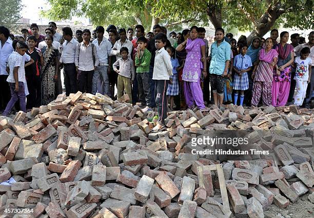 At least one student killed and 23 school children received injuries when an under construction wall of a building collapsed on them, at Barola...