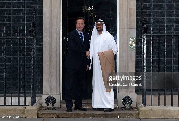 British Prime Minister David Cameron greets the Crown Prince of Abu Dhabi, Mohammed bin Zayed Al Nahyan at 10 Downing Street on October 16, 2014 in...