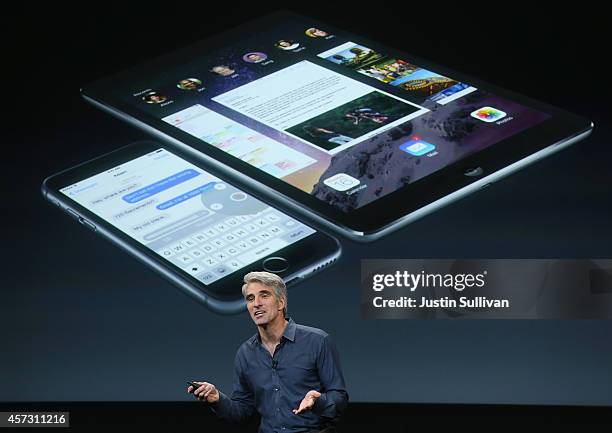 Apple's Senior Vice President of Software Engineering Craig Federighi speaks during an event introducing new iPads at Apple's headquarters October...