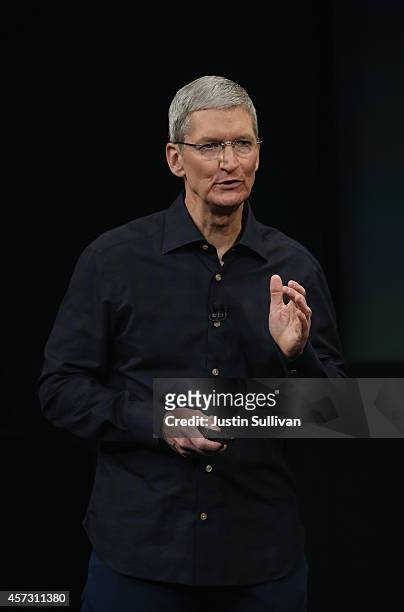 Apple CEO Tim Cook speaks during an event introducing new iPads at Apple's headquarters October 16, 2014 in Cupertino, California.