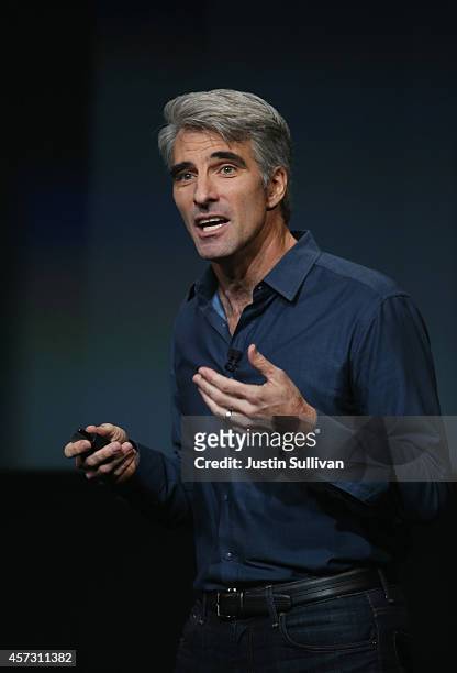 Apple's Senior Vice President of Software Engineering Craig Federighi speaks during an event introducing new iPads at Apple's headquarters October...