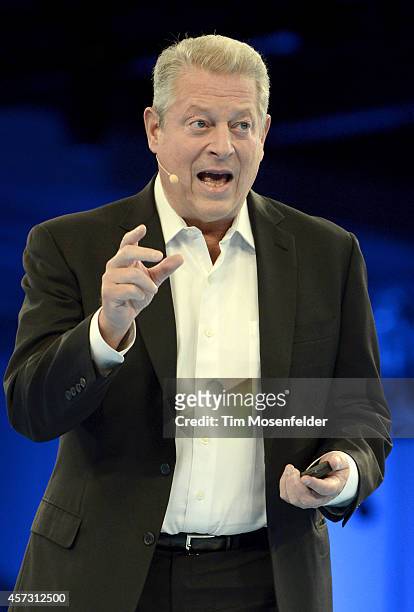 Former Vice President Al Gore delivers a keynote speech at Salesforce.com's Dreamforce 2014 Conference at Moscone South on October 16, 2014 in San...