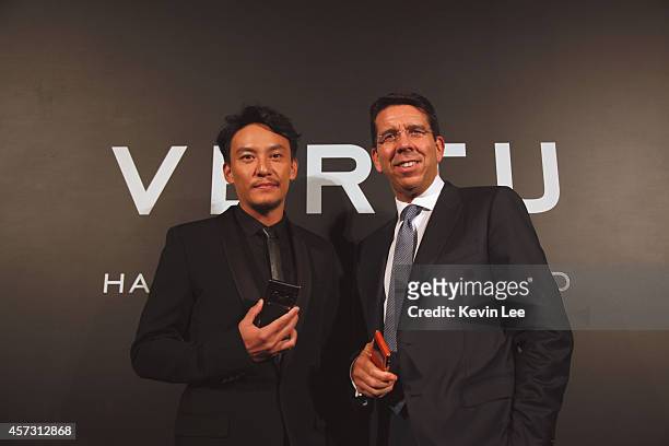 Zhang Zhen and Massimiliano Pogliani poses for a picture at the Vertu Aster Launch party on October 16, 2014 in Shanghai, China.