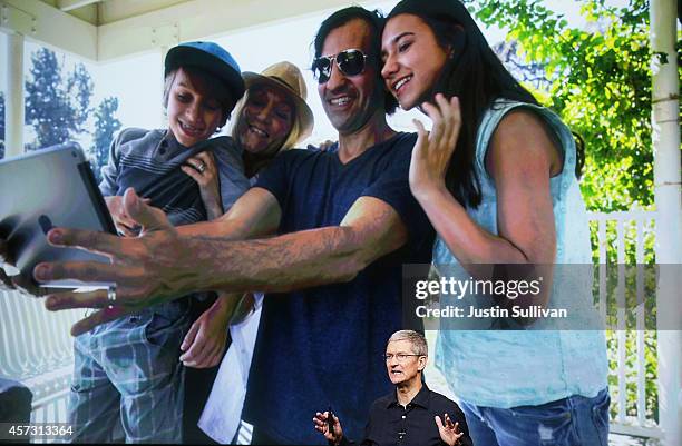 Apple CEO Tim Cook speaks during an Apple special event on October 16, 2014 in Cupertino, California. Apple unveiled the new iPad Air 2 tablet, iPad...