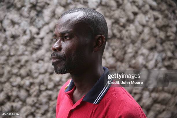 Ebola survivor Oliver Weeh stands in the low-risk area of the Doctors Without Borders , Ebola treatment center after recovering and being released on...