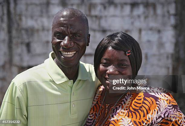 Ebola survivors Anthony Naileh and his wife Bendu Naileh stand at the Doctors Without Borders , Ebola treatment center after meeting with fellow...