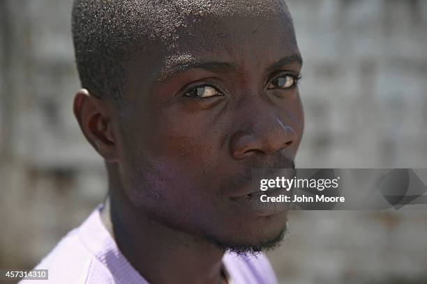 Ebola survivor Mohammed Wah stands in the low-risk section of the Doctors Without Borders , Ebola treatment center on October 16, 2014 in...