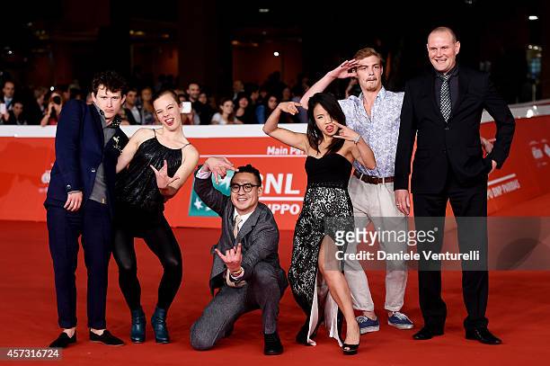 Joel Basman, Saskia Rosendahl, director Burhan Qurbani, actress Trang Le Hong, actors David Schuette and Devid Striesow attend the 'We are young. We...
