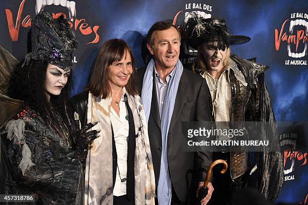 French actor Christophe Malavoy and his wife Isabelle pose prior the premiere of the musical comedy "Le Bal Des Vampires" or "The Fearless Vampire...