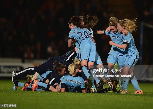 Players of Manchester City Ladies celebrate victory during the Continental Cup Final between Arsenal Ladies and Manchester City Ladies at Adams Park...