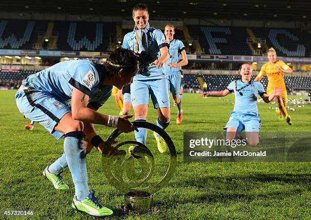 Players of Manchester City Ladies celebrate victory during the Continental Cup Final between Arsenal Ladies and Manchester City Ladies at Adams Park...