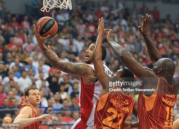 Marcus Williams of Crvena Zvezda Belgrade in action against Nolan Smith and Nate Jawai of Galatasaray Liv Hospital Istanbul during the 2014-2015...