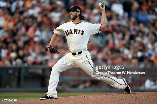 Madison Bumgarner of the San Francisco Giants pitches in the first inning while taking on the St. Louis Cardinals during Game Five of the National...