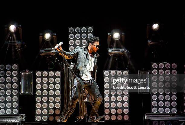Miguel performs in concert at The Palace of Auburn Hills on December 16, 2013 in Auburn Hills, Michigan.