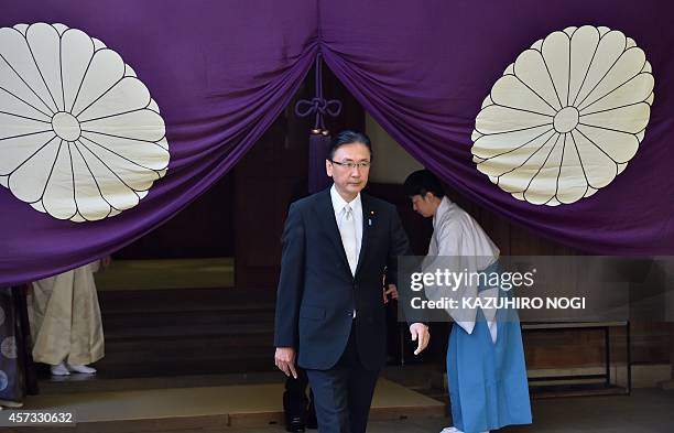 Japanese former state minister Keiji Furuya leaves the controversial Yasukuni shrine on October 17, 2014. More than 100 Japanese lawmakers on October...