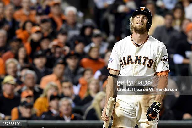 Hunter Pence of the San Francisco Giants reacts after striking out in the sixth inning against the St. Louis Cardinals during Game Five of the...