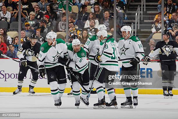 Jamie Benn of the Dallas Stars celebrates his goal with teammates during the third period against the Pittsburgh Penguins at Consol Energy Center on...