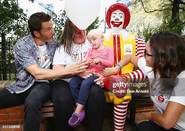 True Blood star, Ryan Kwanten and his girlfriend Ashley Sisino chat with Coby Davies and her mother Shae Hately at Ronald McDonald House Randwick on...