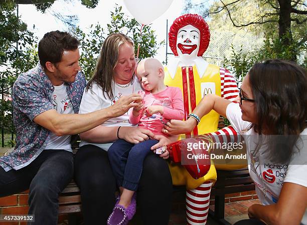 True Blood star, Ryan Kwanten and his girlfriend Ashley Sisino chat with Coby Davies and her mother Shae Hately at Ronald McDonald House Randwick on...