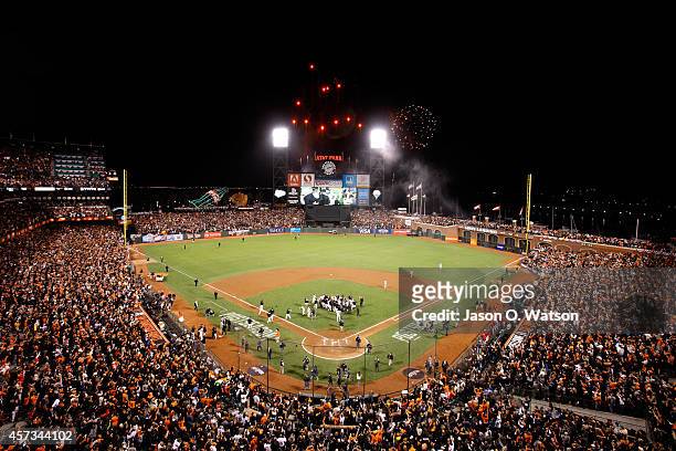 The San Francisco Giants celebrate after defeating the St. Louis Cardinals 6-3 during Game Five of the National League Championship Series at AT&T...