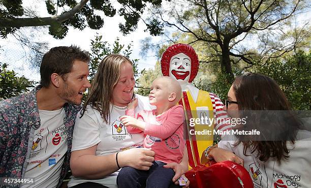 True Blood star, Ryan Kwanten and his girlfriend Ashley Sisino chat with Coby Davies and her mother Shae Hately at Ronald McDonald House Randwick on...