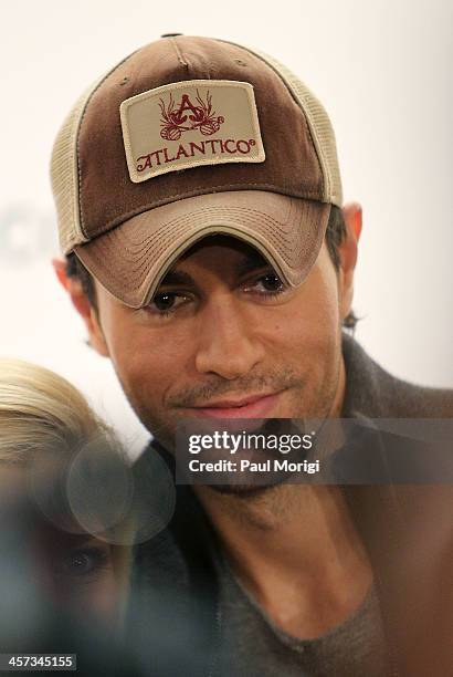 Enrique Iglesias backstage at the Hot 99.5's Jingle Ball 2013 at Verizon Center on December 16, 2013 in Washington, DC.