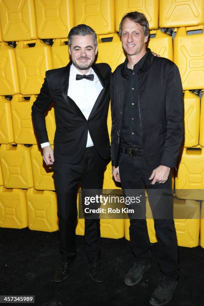 Tony Hawk and charity: water founder Scott Harrison attend the 8th annual charity: ball Gala at the Duggal Greenhouse on December 16, 2013 in the...