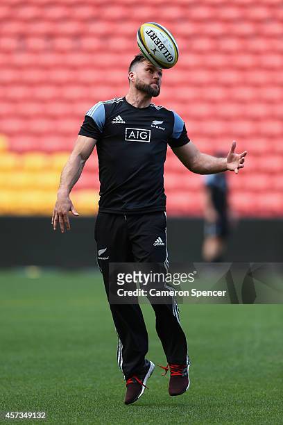 Cory Jane of the All Blacks heads the ball during a New Zealand All Blacks Captain's Run at Suncorp Stadium on October 17, 2014 in Brisbane,...