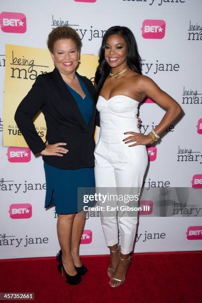 Debra Lee and Gabrielle Union attend the New Series "Being Mary Jane" Los Angeles Premiere on December 16, 2013 in Los Angeles, California.