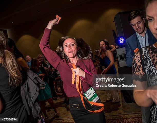 Trish Brawner, winner of a Kindle Fire, seen during the 2014 ANA Masters of Marketing Conference Casino Night hosted by NUVOtv and Fuse at Rosen...