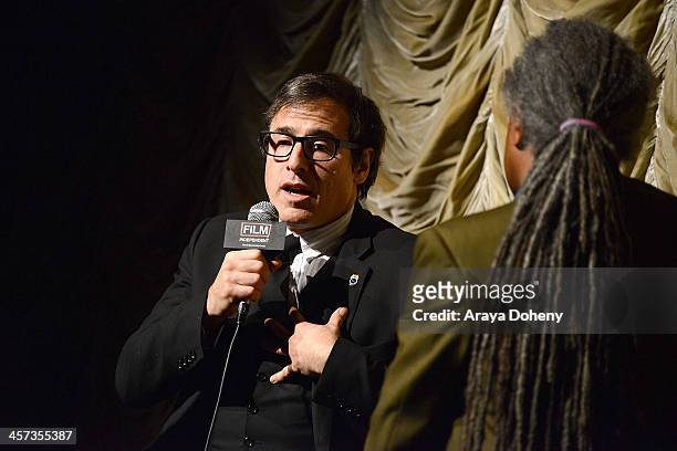 David O. Russell and Elvis Mitchell attend the Film Independent at LACMA screening & Q+A of American Hustle at Bing Theatre At LACMA on December 16,...