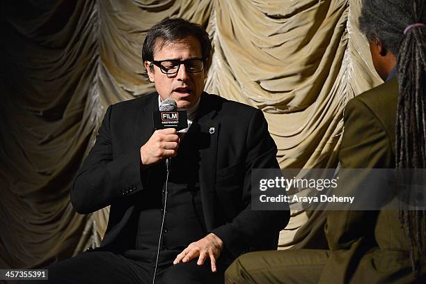 David O. Russell and Elvis Mitchell attend the Film Independent at LACMA screening & Q+A of American Hustle at Bing Theatre At LACMA on December 16,...